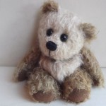 Cute cream-brown bear