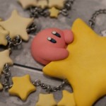 Kirby sitting on a star